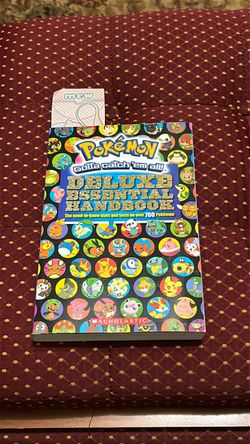 Pokémon Deluxe Essential Handbook by Scholastic