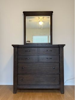 Wooden dresser with mirror