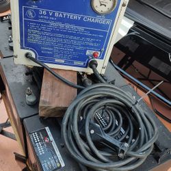 6...Six Volt Golf Cart Batteries And Charger