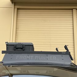 Front Runner Roof Rack with Wind Fairing And Traction Board Mounts.