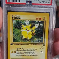 FS/NFT - PSA 9 - 1999 POKEMON PIKACHU FIRST EDITION BASE SET DUEL "W" GOLD STAMP #60