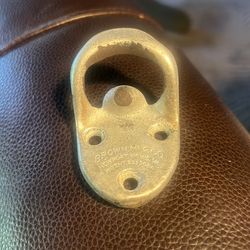 Antique bottle opener