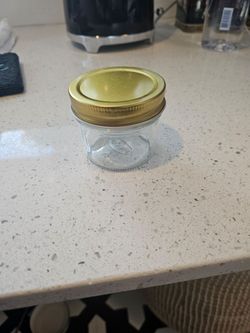 Lot of 50 - 4 oz glass jars with labels