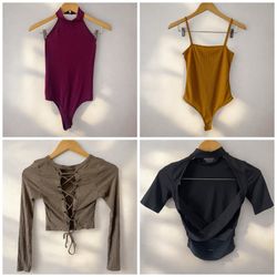 small tops $15each/cada una