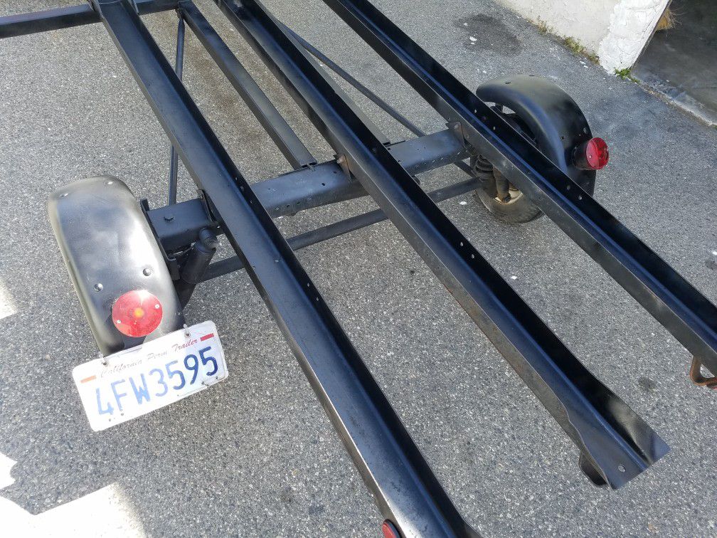 Photo Motorcycle Trailer, With Swibel Ramps, Coil Springs and Shocks Absorber