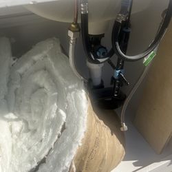 Gorgeous bathroom vanity complete with 2 sinks, faucets, cultured marble countertop, hoses, etc!