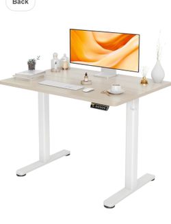 Hardly used Standing desk - adjustable soothing nature sand color