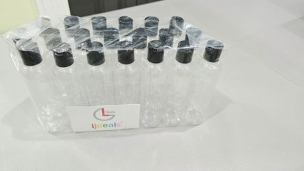 140 New 8 oz Clear Plastic Bottles w/ Black Caps, 7 Packs