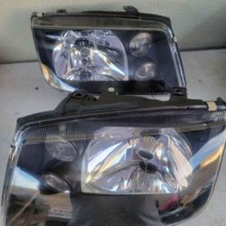 99-05 Volkswagen Jetta Headlights LUCES MICAS FAROS Calaveras Focos