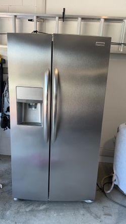 Kitchen aid double oven, microwave, dishwasher , and Frigidaire Gallery refrigerator