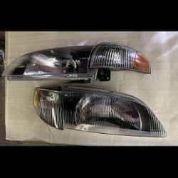 98-99 Mazda 626 Headlights Faros Calaveras Micas Luces 