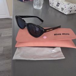 Miu Miu Lentes
