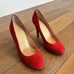 Elegant red suede-style pumps by Jessica Simpson.