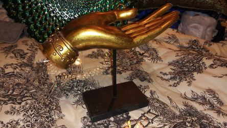 Decorative golden hand