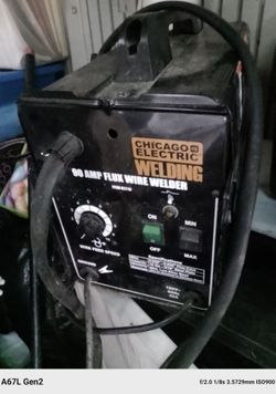 Wire welder works like new with wire on a trade for a lawn mower push mower as long as it runs I'll trade