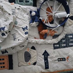 Crib Quilt With Musical Mobile 