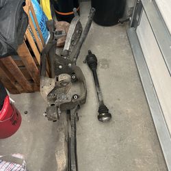 bmw 323 i subframe, upper and lower control arms, and passenger side axle