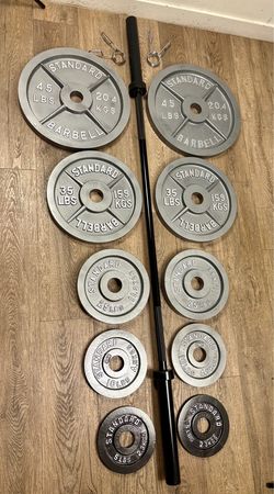 Olympic Set: NEW 6 ft Barbell is cooper bearings & Gray CAP Cast Iron Weight Plates  from 5s to 45s  Pounds In NEW Condition, [Total: 282 lbs]