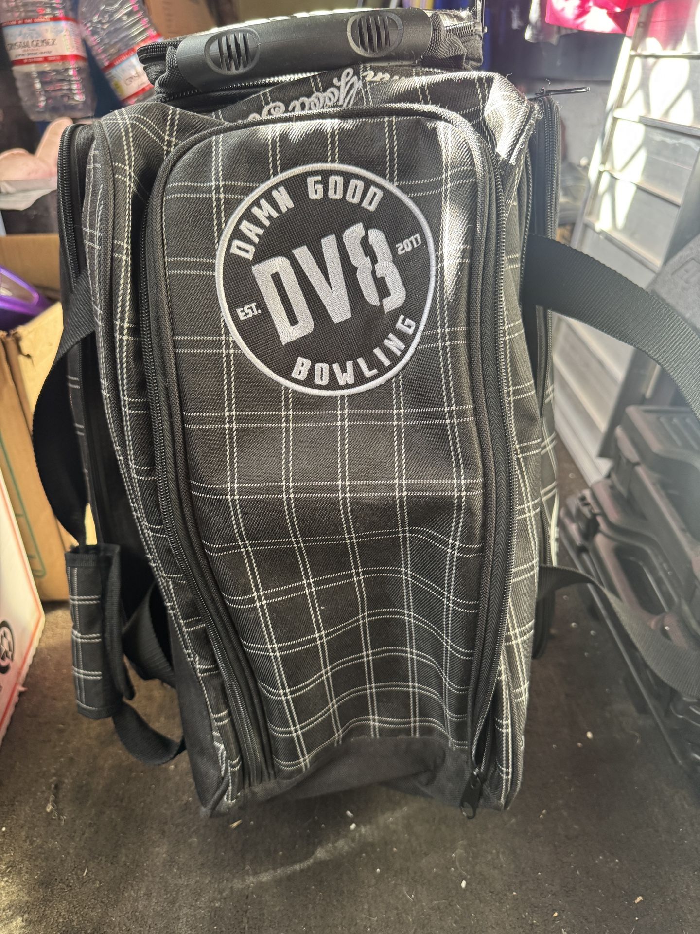 Bowling balls with rolling bowling bag