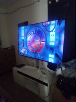 65 in tv with stand/ fireplace