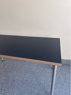 Blue Ikea table 29 1/2 by 59 inch