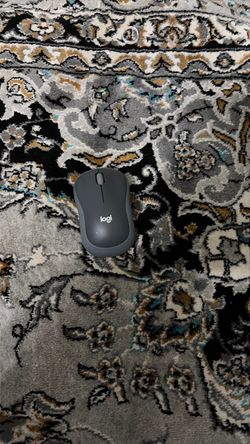 Non-functional Logitech mouse (battery not included)