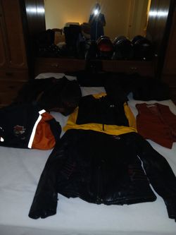 Collection of harly Davidson helmets and jackets and shoes
