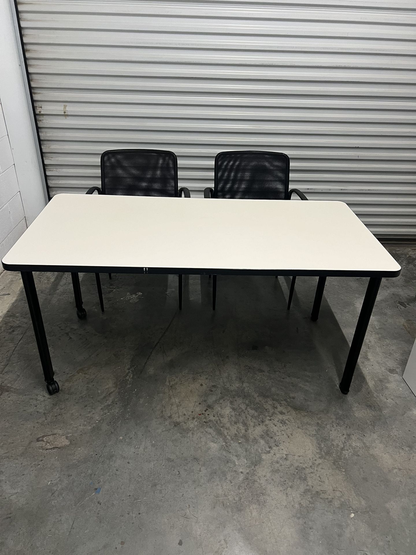 Conference table with chairs
