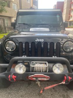 Jeep Wrangler Sahara Unlimited 37” new tires rotors and breaks