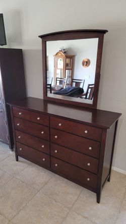 Wood dresser with large removable vanity mirror