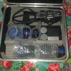 35 Mm Camera W/ 6 Lens And Added On Flash+ 2 Rolls Of Film