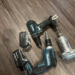 Two Batteries, One Compact Router, One Drywall Screwdriver, And One Drill