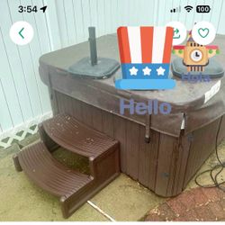 ONE BLACK WEIGHTED UMBRELLA STAND.