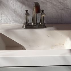 bathroom sink and faucet