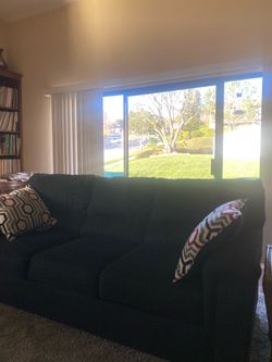 Sofa for sale: 3 cushion, black, width  92” you pick up. more info ((contact info removed))