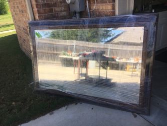 Framed beveled mirror 6 ft by 4ft. Great shape!