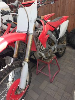 04 Honda CRF250 2stroke runs but needs a little tlc tags expired 1yr will bring up to date this coming week