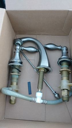 Wide spread faucet