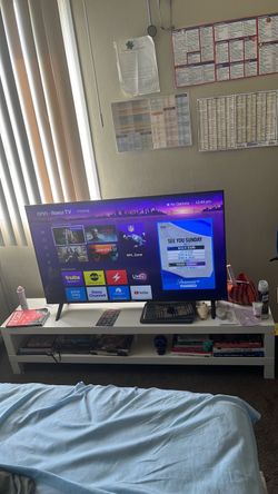 50 inch onn Roku tv and ikea tv stand/book case