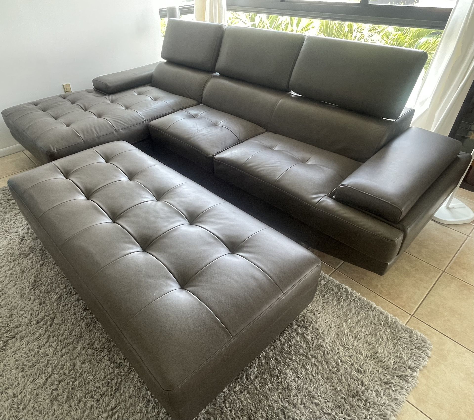 Couch + Ottoman For Sale. Like new Condition