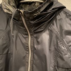 Lululemon Hooded Rain Jacket, Very Stylish With 5 Pockets And Zipper In The Back Perfect Condition Size M