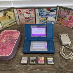 Nintendo DSi XL with 14 Games with Charger and Storage Bag