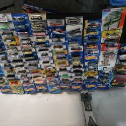 am selling a huge collection of hot wheels.

117 individual still new in the box
1 advent calendar with all of the pieces 
1 new hot curves track
13 n