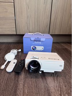 Projector, keyboard and mouse, MacBook Air