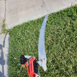 Extended pruning saw with clipper