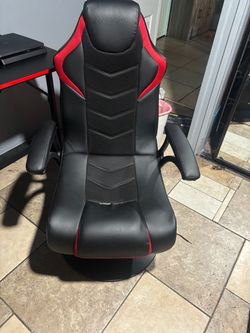 PS4, monitor, chair, and desk