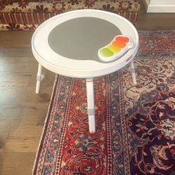 Skip hop table With Chairs