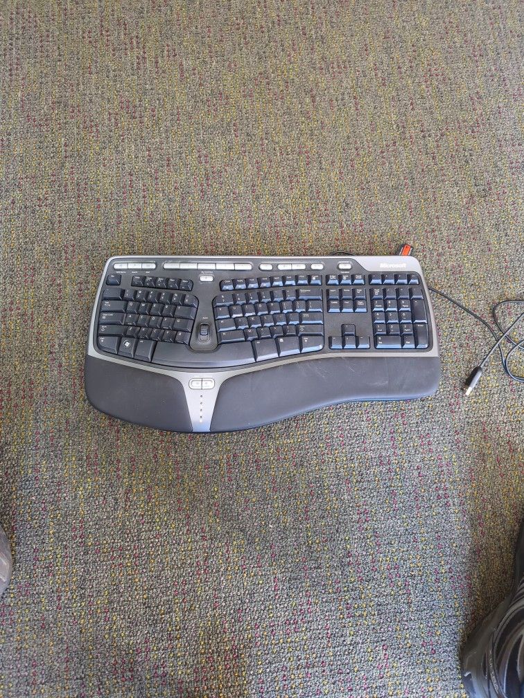 Microsoft Ergo Keyboard.  Works Fine