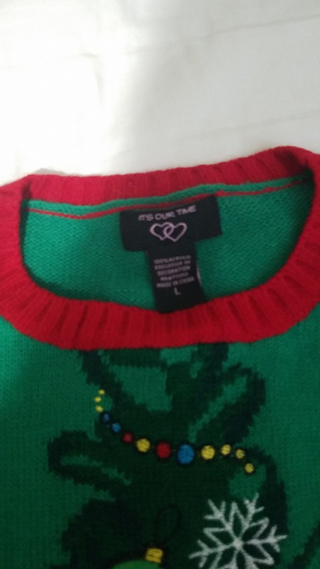 Christmas sweater size large in kids