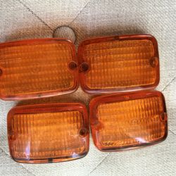 BMW motorcycle amber light covers one missing the rubber lining 